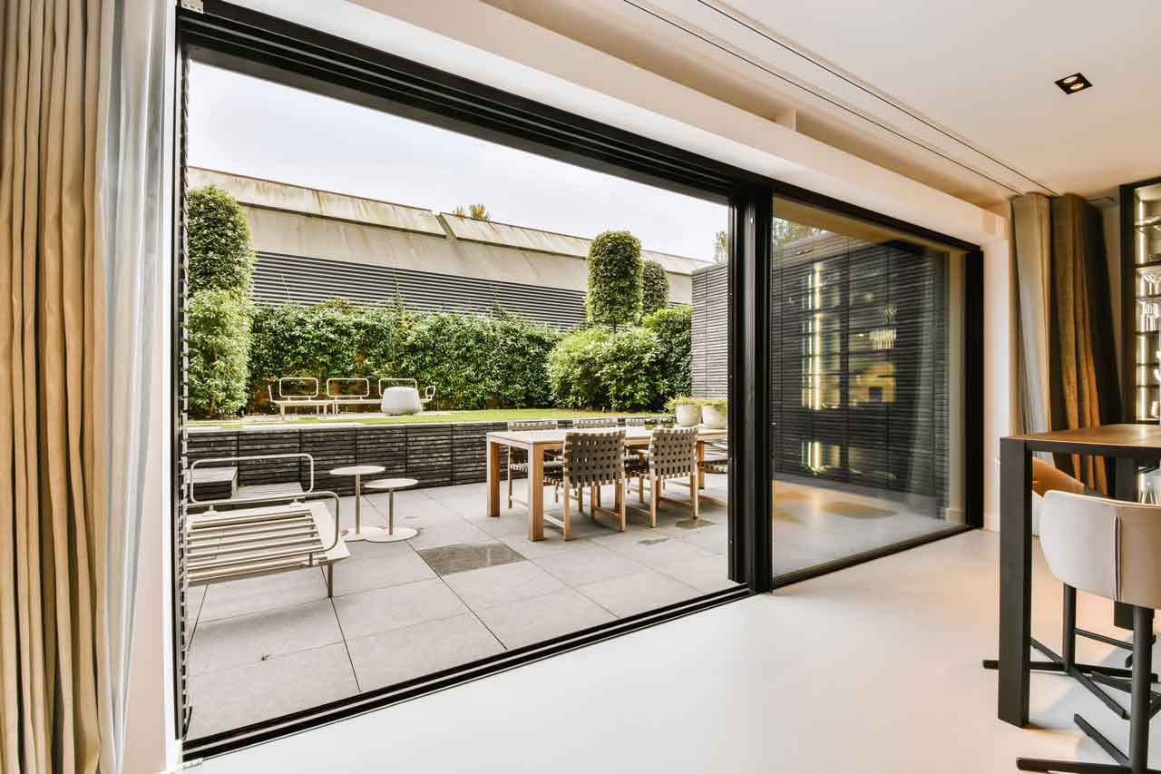 Multi-panel sliding doors